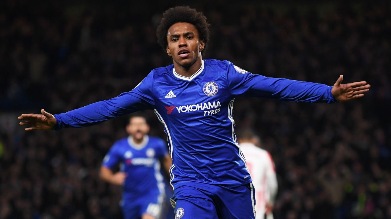 A picture of Willian after scoring for Chelsea.